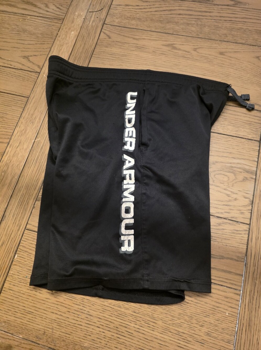 Under Armour Boys Black Athletic Shorts with White Logo